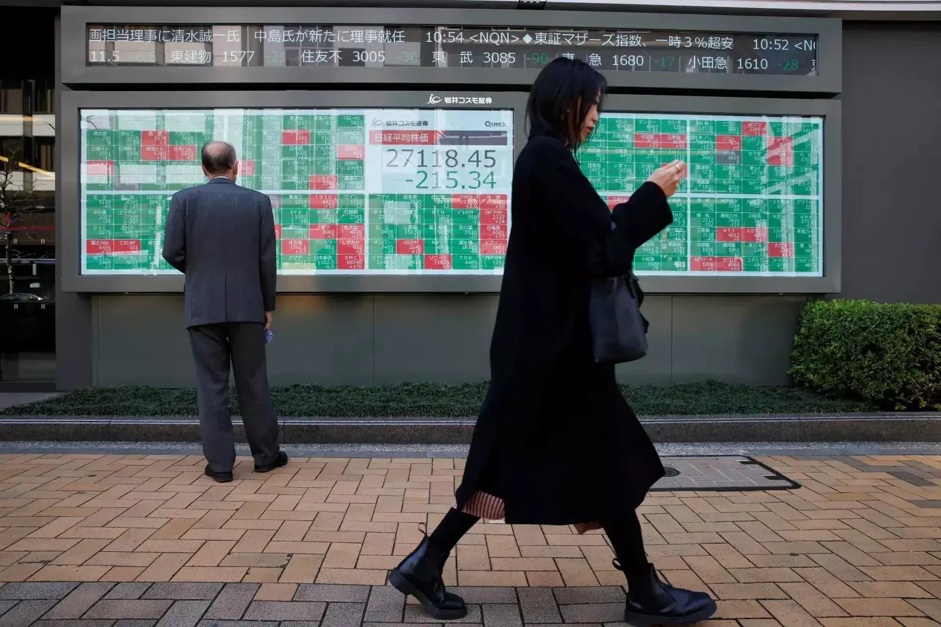 Nikkei posts record quarterly gain as US stocks hit 52,000 milestone