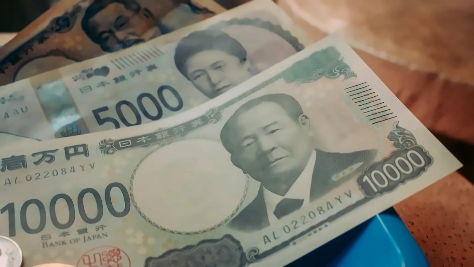 Asian stocks mixed as yen surges; oil hits $97 amid Iran threats