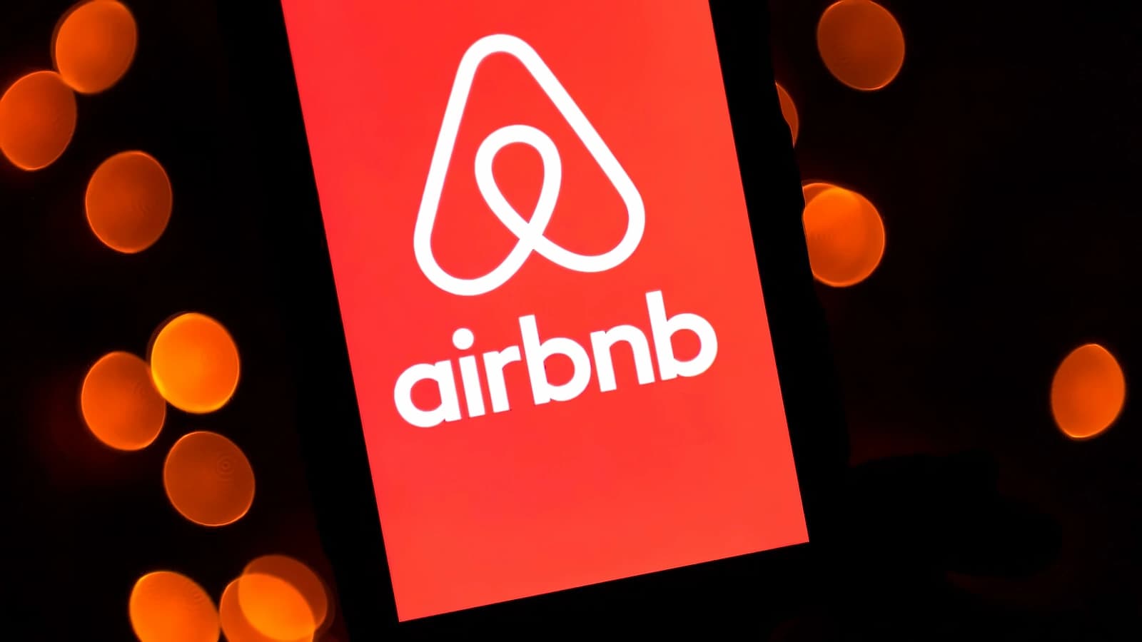 Airbnb shares surge 15% to four-year high on raised forecast, AI gains