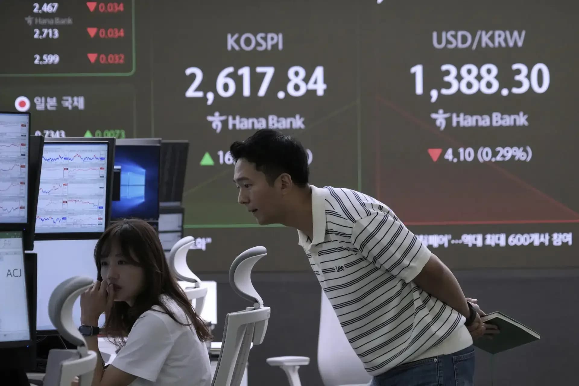 Asian stocks mixed ahead of Trump-Xi summit; AI rally continues
