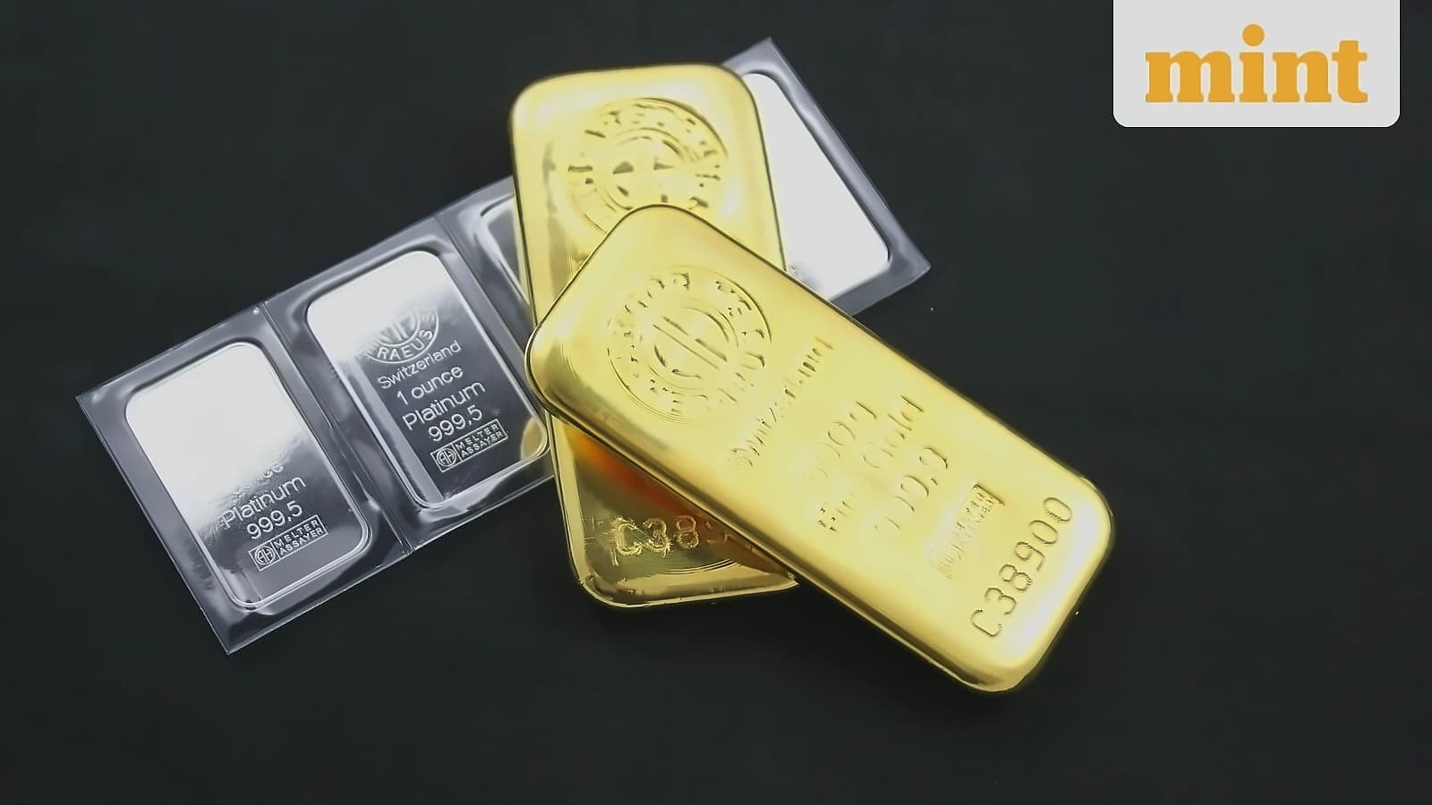 Gold, silver edge lower in range-bound trade amid Fed watch