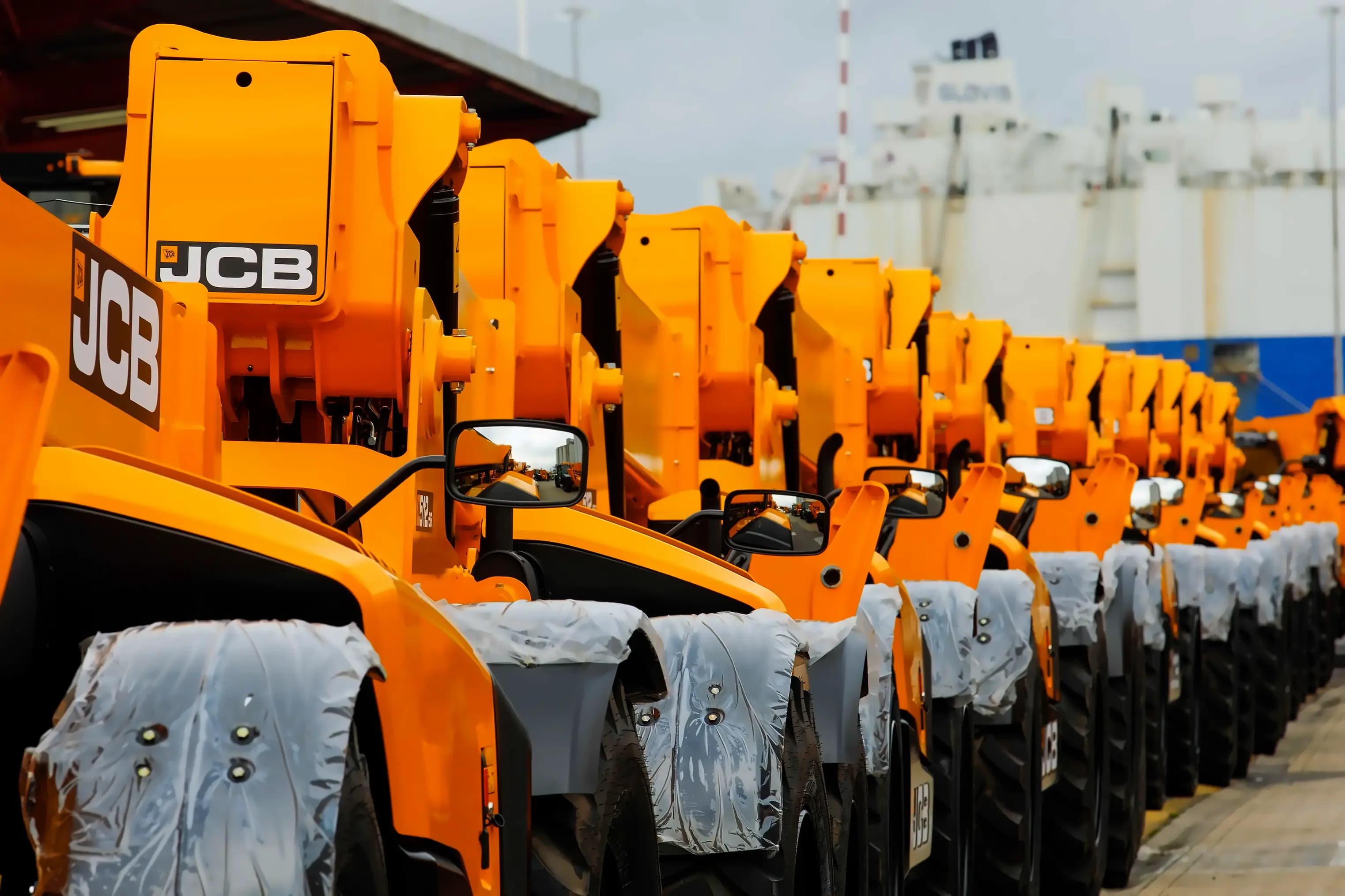 JCB Names George Bamford Co-Chair as Profits Drop to £642M