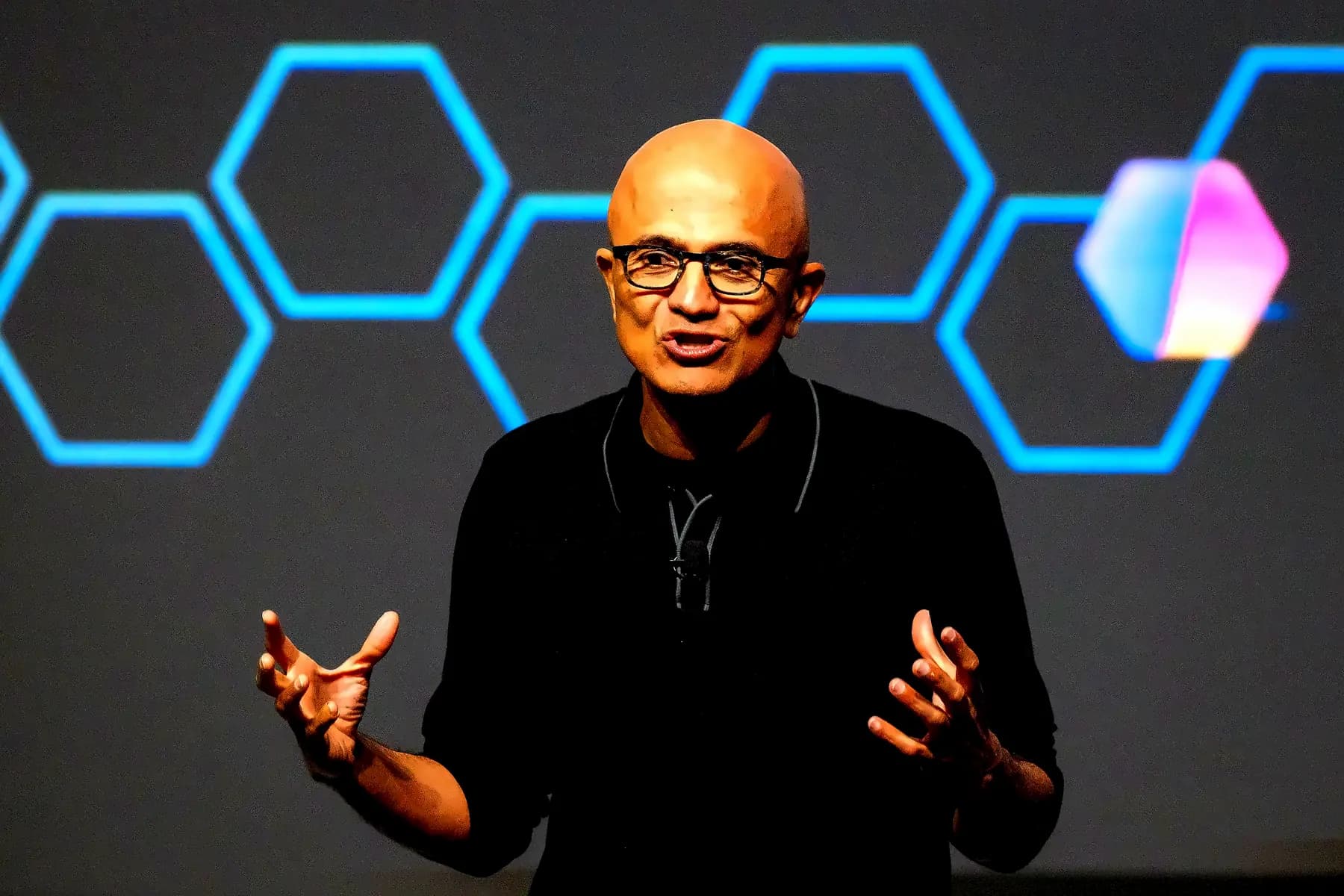 Nadella, Cook Join Trump-Xi Tech Summit Amid AI Debate
