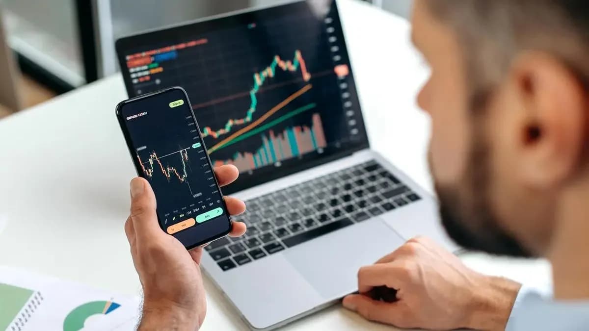 Nifty ends marginally higher at 24,252, Sensex flat at 77,540